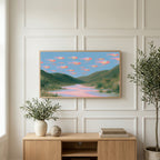 Flying fish art on a TV above a light oak sideboard with olive branches in a bright living room
