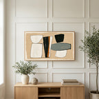 Mid century abstract shapes art on a TV above a light oak sideboard with olive branches in a bright living room