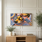 Mediterranean lemons art on a TV above a light oak sideboard with olive branches in a bright living room