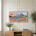 Crayon Mount Fuji art on a TV above a light oak sideboard with olive branches in a bright living room