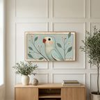 Vintage blue parrot art on a TV above a light oak sideboard with olive branches in a bright living room