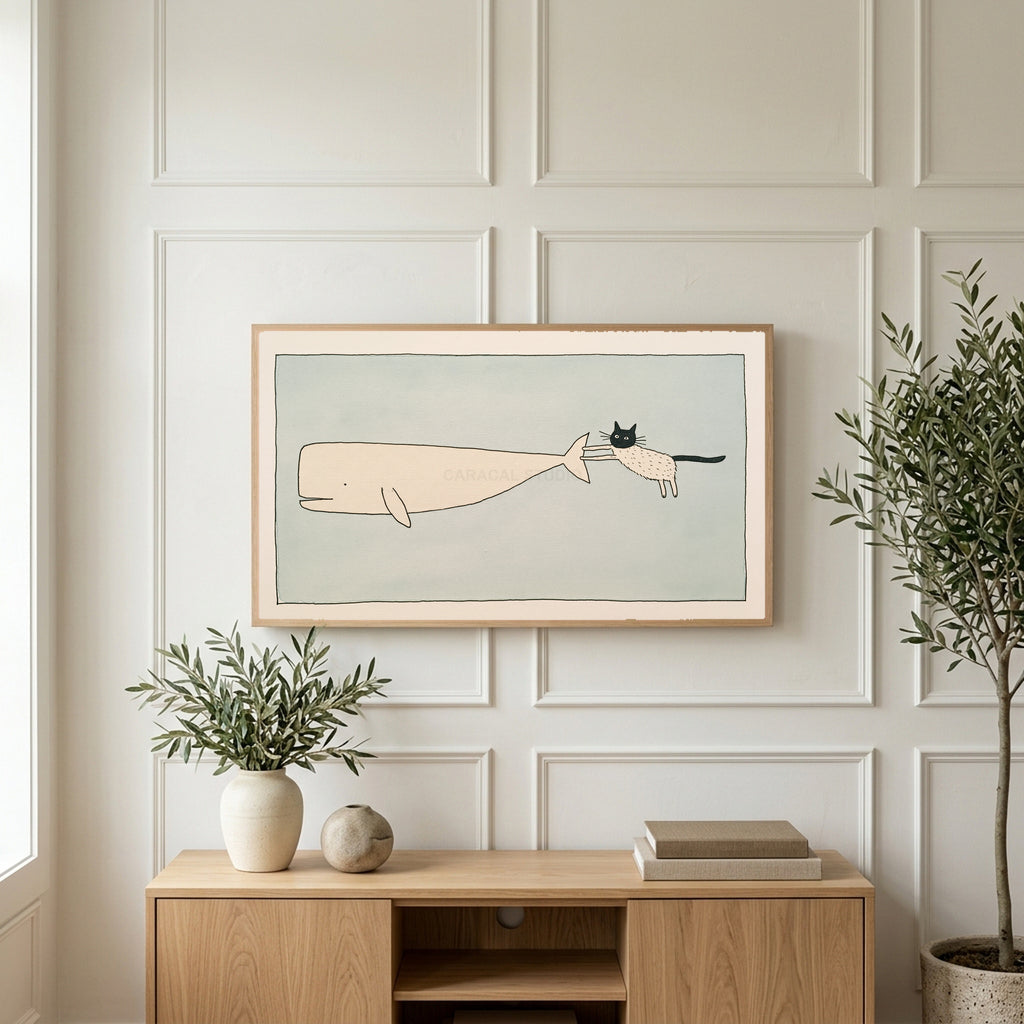Cat and whale art on a TV above a light oak sideboard with olive branches in a bright living room