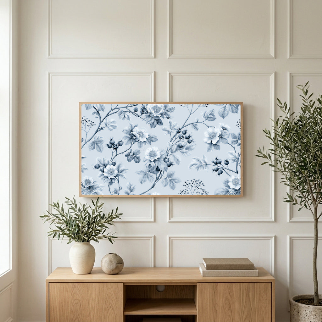 Toile wild roses art on a TV above a light oak sideboard with olive branches in a bright living room