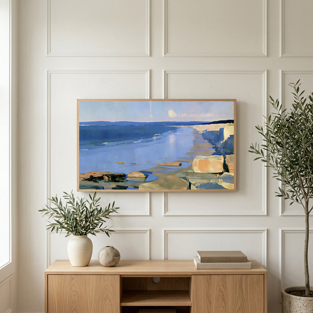 Low tide beach and cliffs art on a TV above a light oak sideboard with olive branches in a bright living room