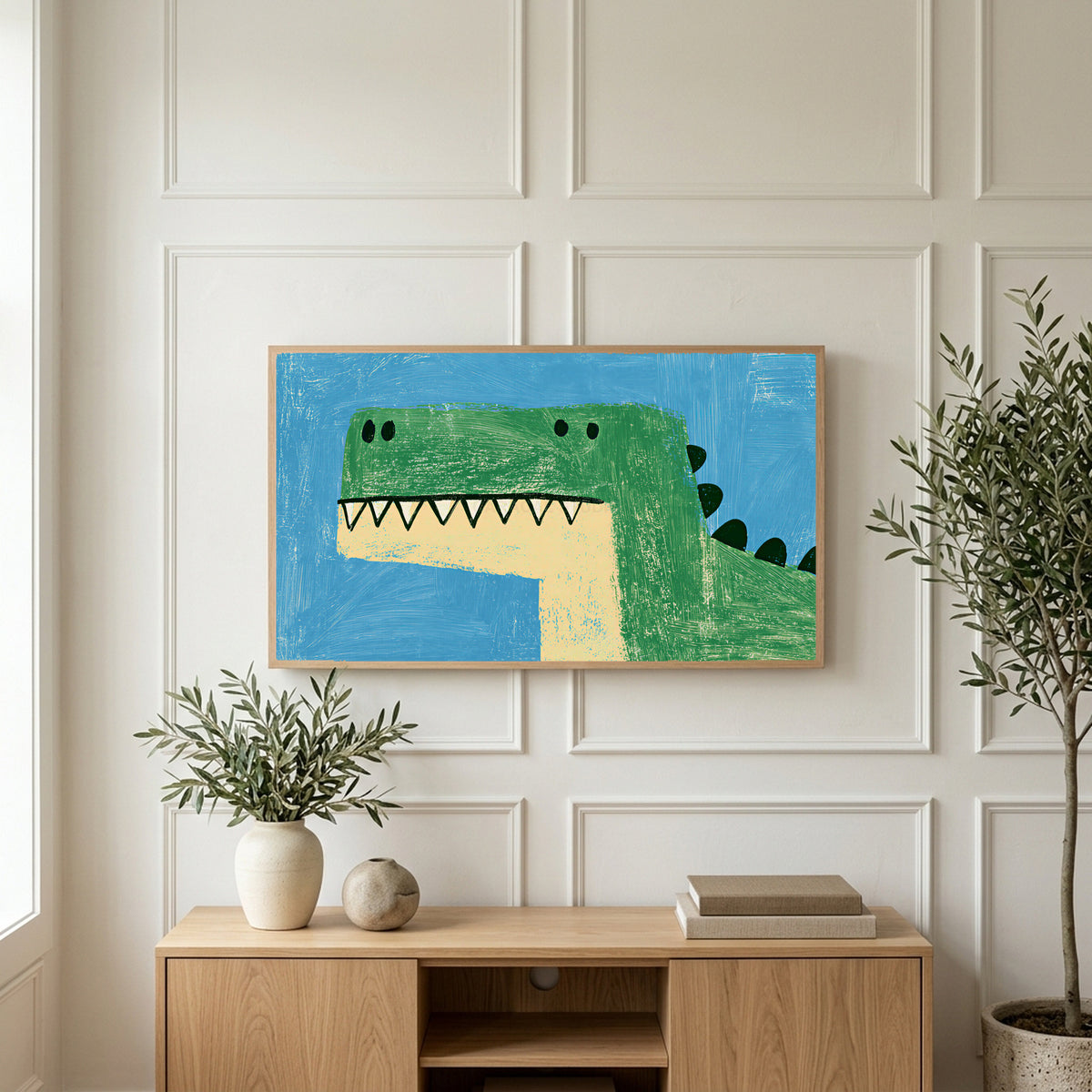 Green T rex dinosaur art on a TV above a light oak sideboard with olive branches in a bright living room