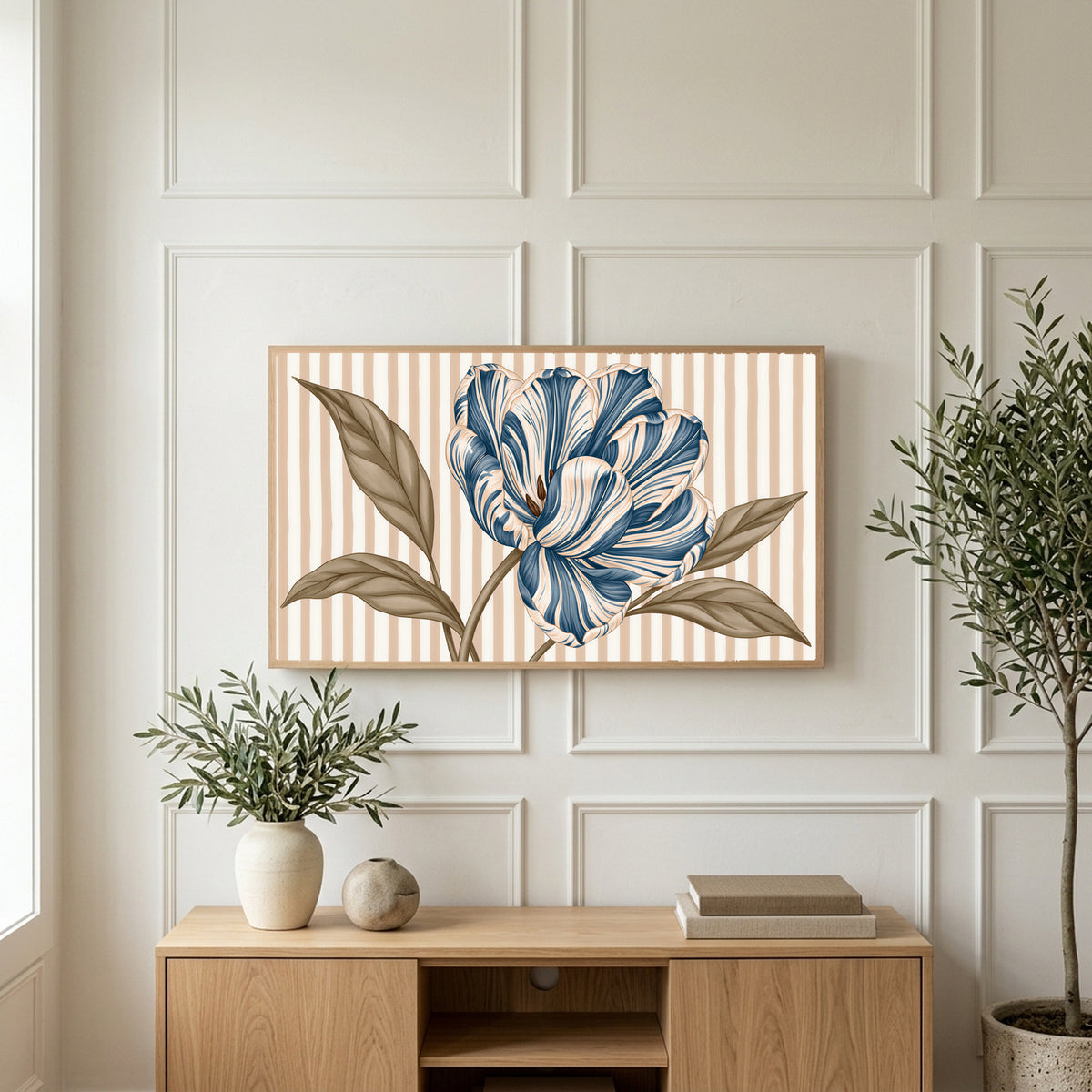 Striped tulip art on a TV above a light oak sideboard with olive branches in a bright living room