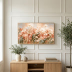 Terracotta wildflower meadow art on a TV above a light oak sideboard with olive branches in a bright living room