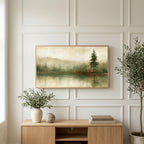 Misty lake pine art on a TV above a light oak sideboard with olive branches in a bright living room