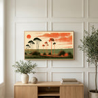 Block print trees art on a TV above a light oak sideboard with olive branches in a bright living room