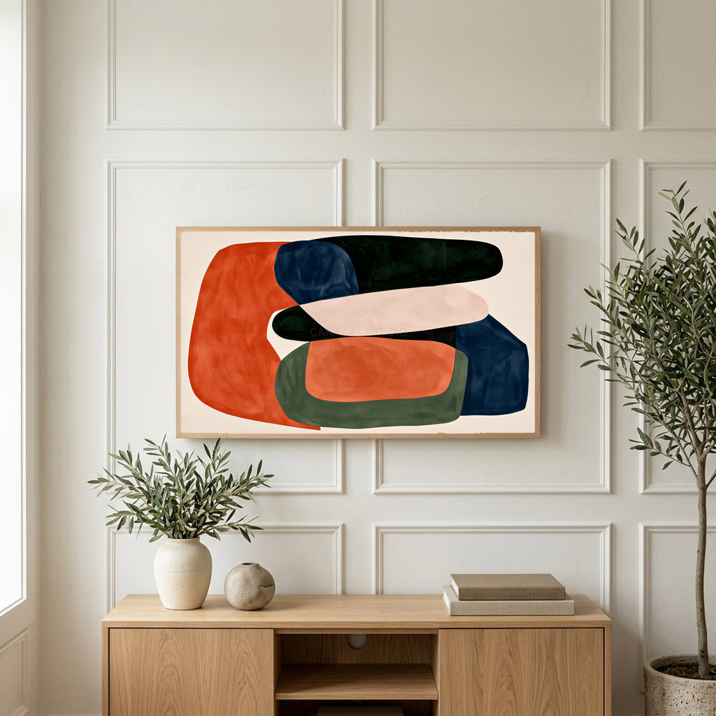 Abstract organic shapes art on a TV above a light oak sideboard with olive branches in a bright living room