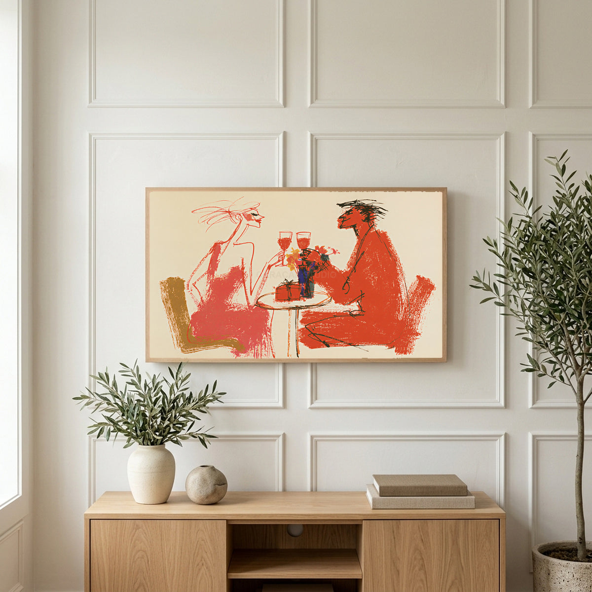 Wine toast art on a TV above a light oak sideboard with olive branches in a bright living room