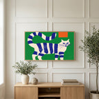 Blue striped cat art on a TV above a light oak sideboard with olive branches in a bright living room