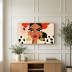 Fashion portrait art on a TV above a light oak sideboard with olive branches in a bright living room