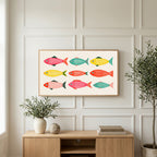Folk fish art on a TV above a light oak sideboard with olive branches in a bright living room