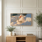 Duck reading in bed art on a TV above a light oak sideboard with olive branches in a bright living room