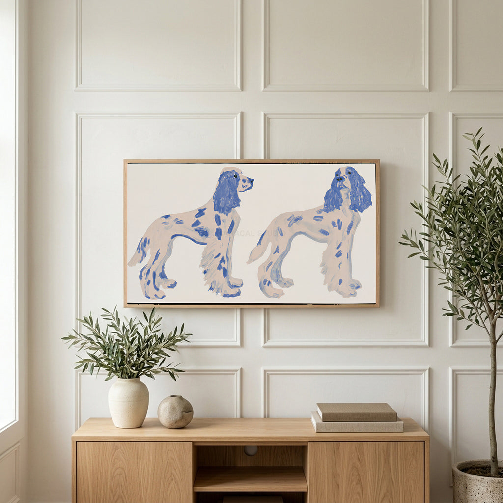 Spaniel figurines art on a TV above a light oak sideboard with olive branches in a bright living room