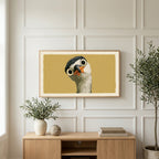 Funny heron art on a TV above a light oak sideboard with olive branches in a bright living room