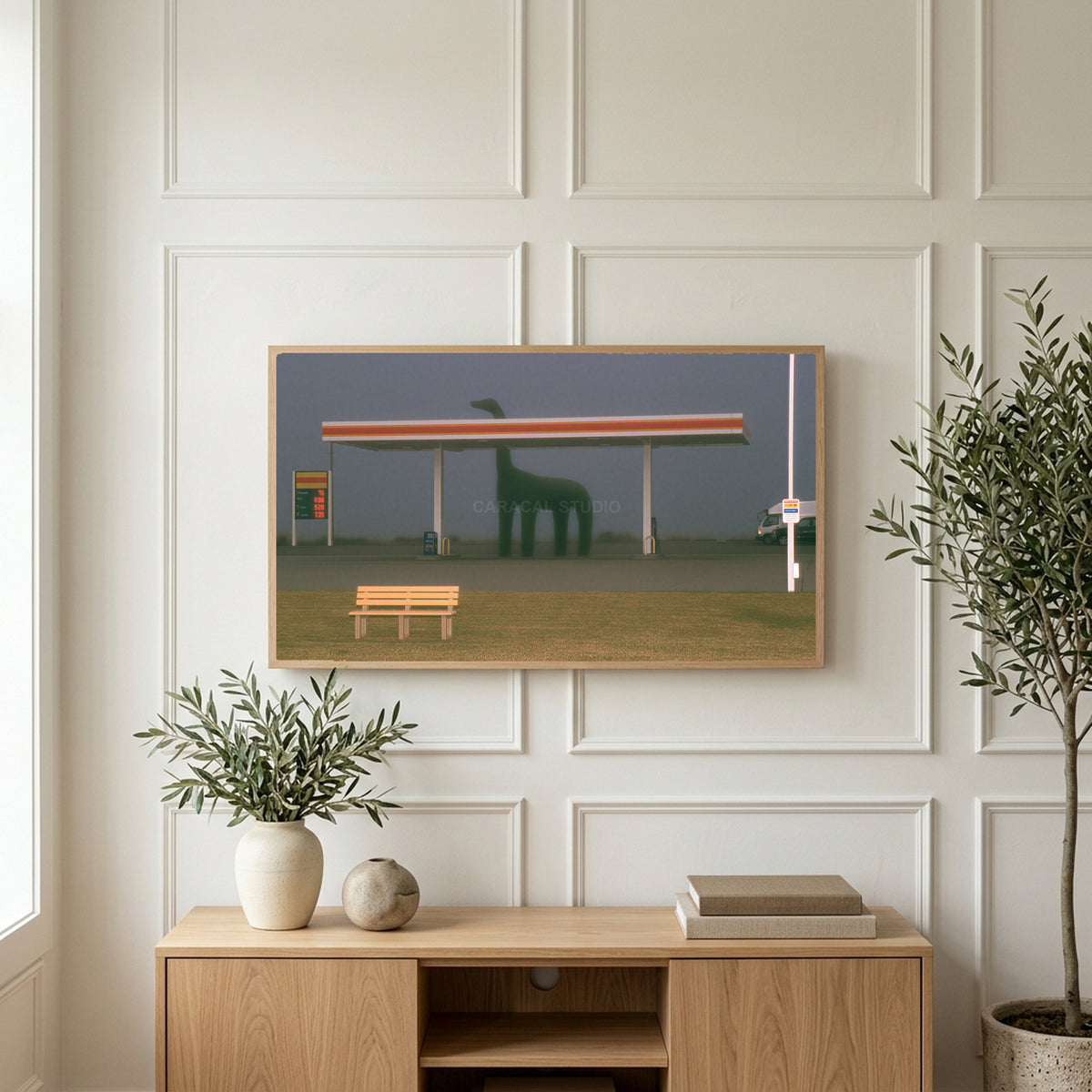 Foggy gas station art on a TV above a light oak sideboard with olive branches in a bright living room