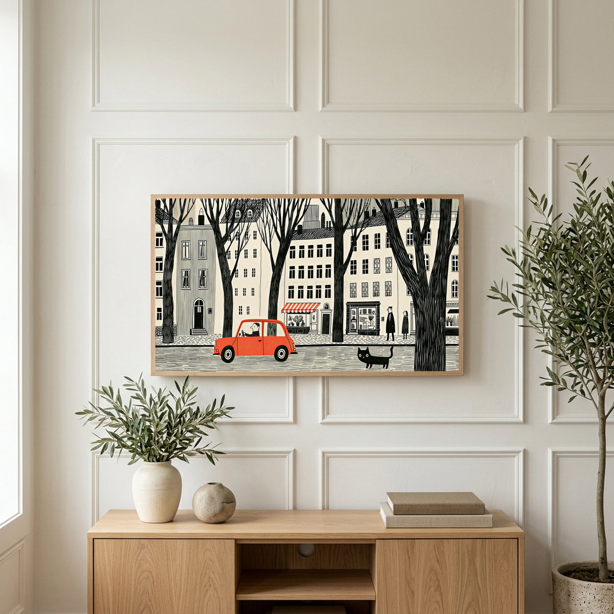 City street art on a TV above a light oak sideboard with olive branches in a bright living room