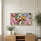 Flower bouquets art on a TV above a light oak sideboard with olive branches in a bright living room