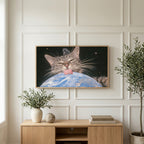 Space cat art on a TV above a light oak sideboard with olive branches in a bright living room