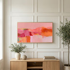 Pink abstract color blocks art on a TV above a light oak sideboard with olive branches in a bright living room