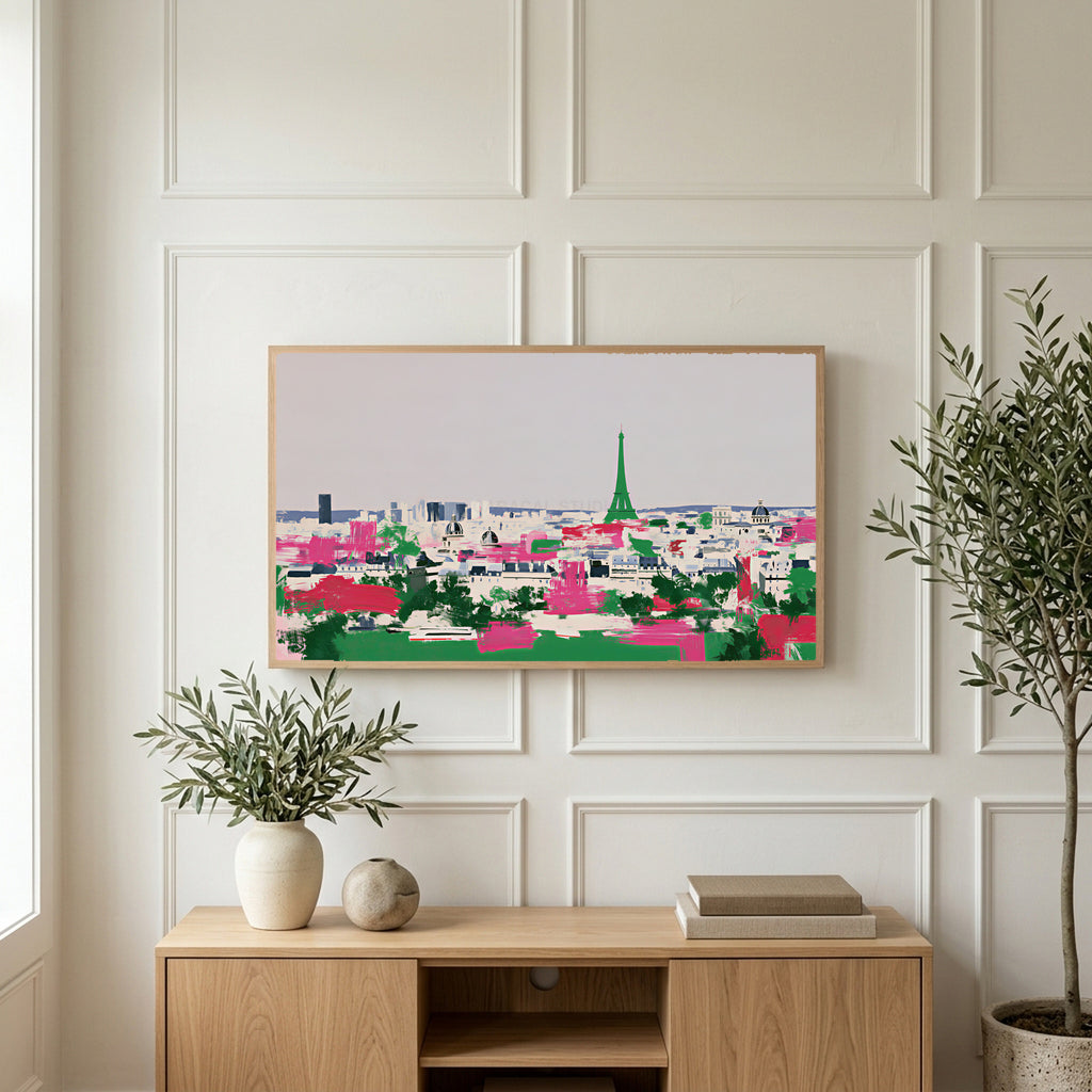 Paris skyline art on a TV above a light oak sideboard with olive branches in a bright living room