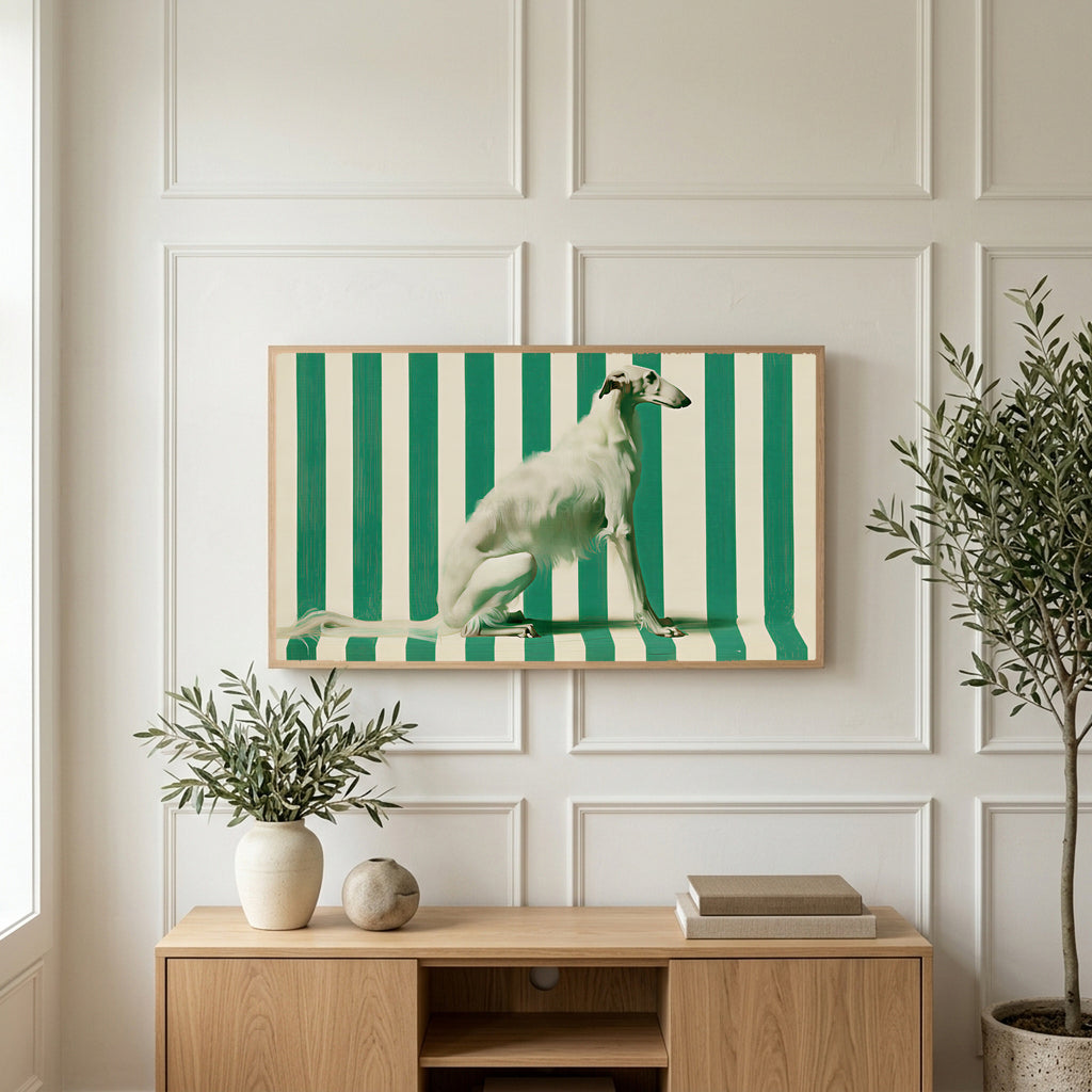 Borzoi art on a TV above a light oak sideboard with olive branches in a bright living room