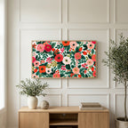 Painted roses and berries art on a TV above a light oak sideboard with olive branches in a bright living room