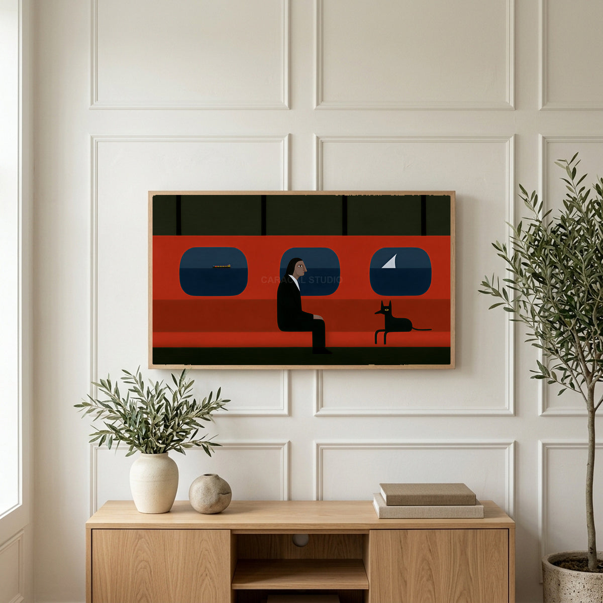 Ferry man and black dog art on a TV above a light oak sideboard with olive branches in a bright living room