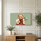 Teddy bear art on a TV above a light oak sideboard with olive branches in a bright living room