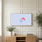 Umbrella kitten art on a TV above a light oak sideboard with olive branches in a bright living room