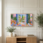 Mediterranean garden view art on a TV above a light oak sideboard with olive branches in a bright living room