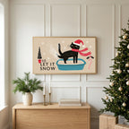 Let It Snow cat TV art above an oak sideboard next to a decorated Christmas tree