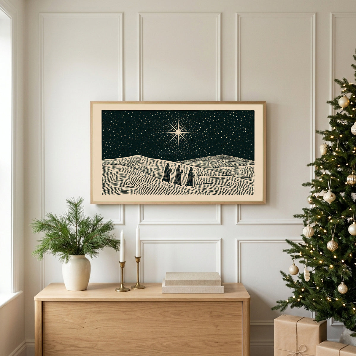 Three wise men TV art above an oak sideboard next to a decorated Christmas tree