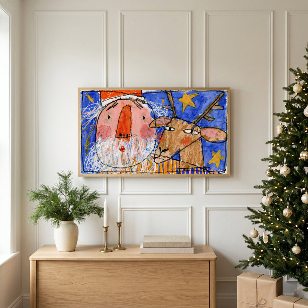 Christmas TV art above an oak sideboard next to a decorated Christmas tree