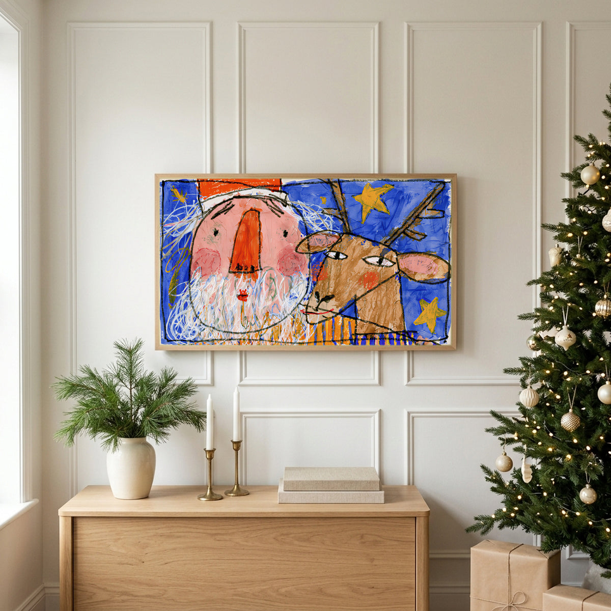 Christmas TV art above an oak sideboard next to a decorated Christmas tree