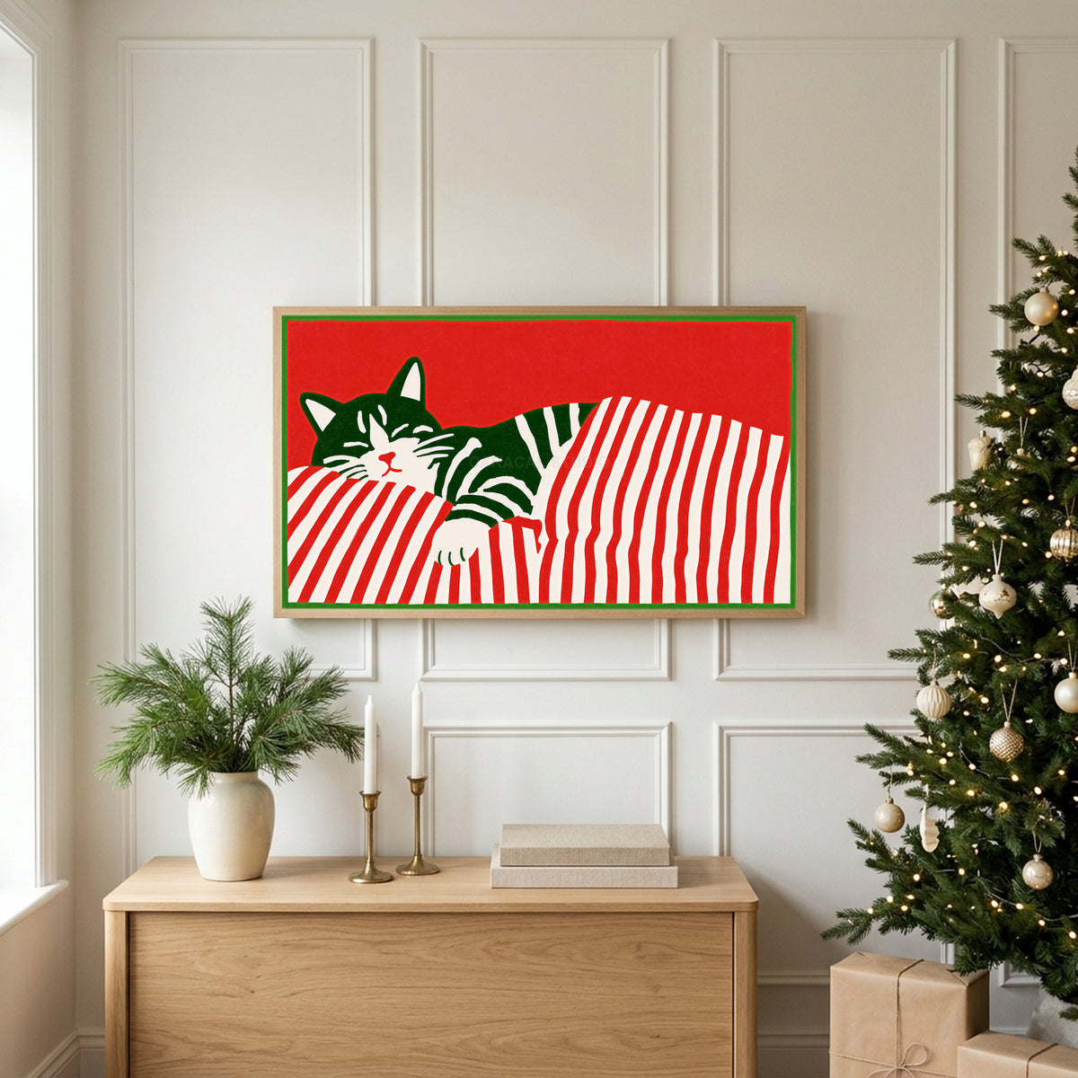 Sleeping cat and candy cane stripes TV art above an oak sideboard next to a decorated Christmas tree
