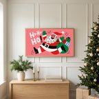Jumping Santa TV art above an oak sideboard next to a decorated Christmas tree