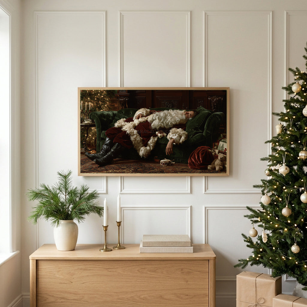 Sleeping Santa TV art above an oak sideboard next to a decorated Christmas tree