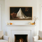 Halloween TV art above a white fireplace with small pumpkins on the mantel