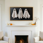 Textured ghosts TV art above a white fireplace with small pumpkins on the mantel