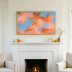 Autumn leaves TV art above a white fireplace with small pumpkins on the mantel
