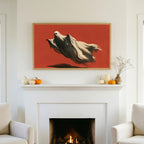 Halloween TV art above a white fireplace with small pumpkins on the mantel