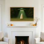 Ghost and UFO TV art above a white fireplace with small pumpkins on the mantel
