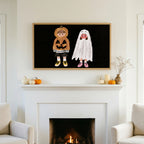 Halloween TV art above a white fireplace with small pumpkins on the mantel