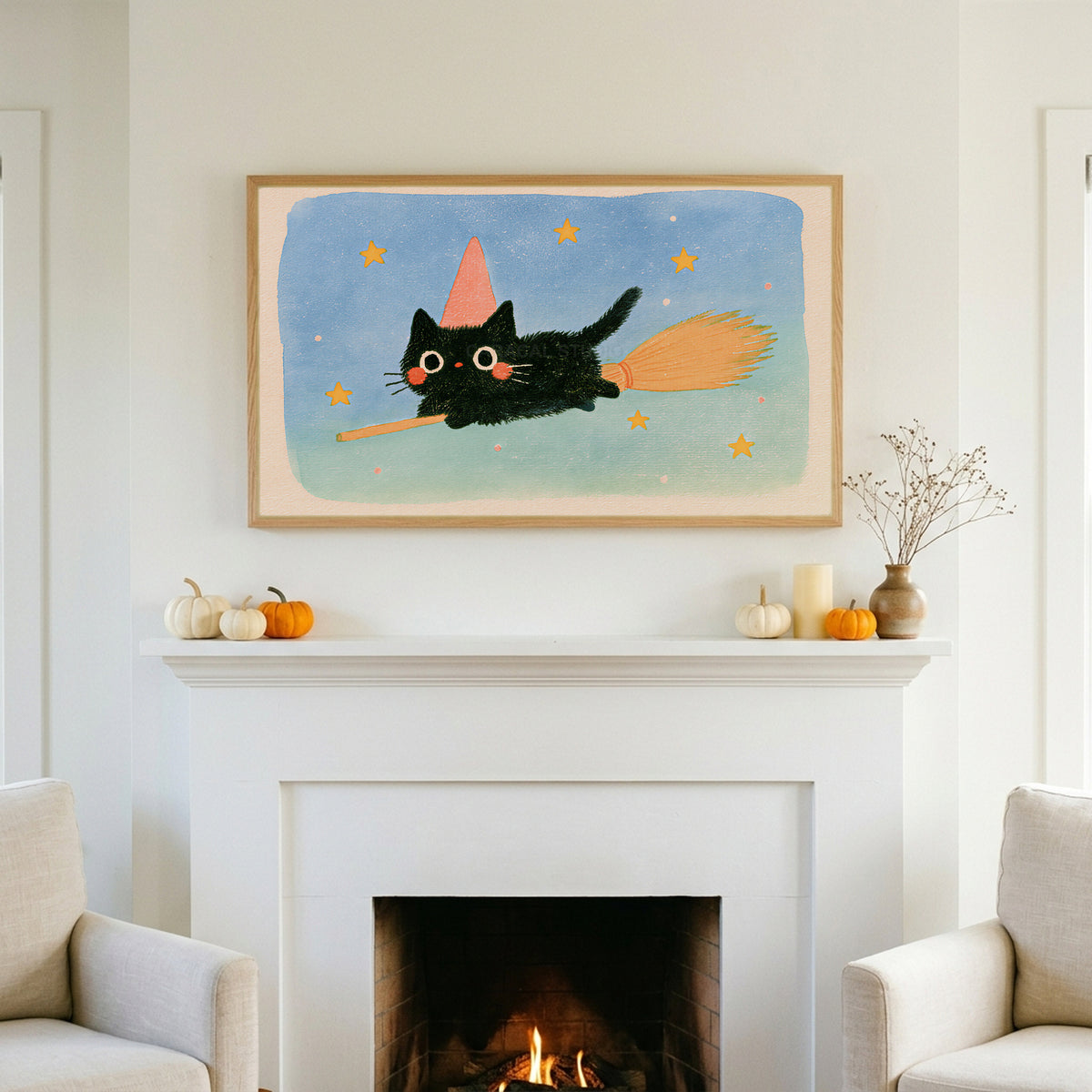 Black cat witch TV art above a white fireplace with small pumpkins on the mantel