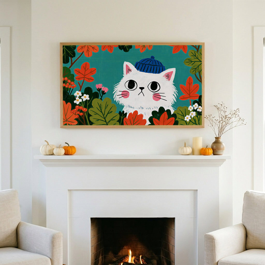 Autumn cat TV art above a white fireplace with small pumpkins on the mantel