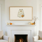 Halloween TV art above a white fireplace with small pumpkins on the mantel