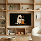 Sad ghost and beer art on a TV in built-in oak shelves with pumpkins and books
